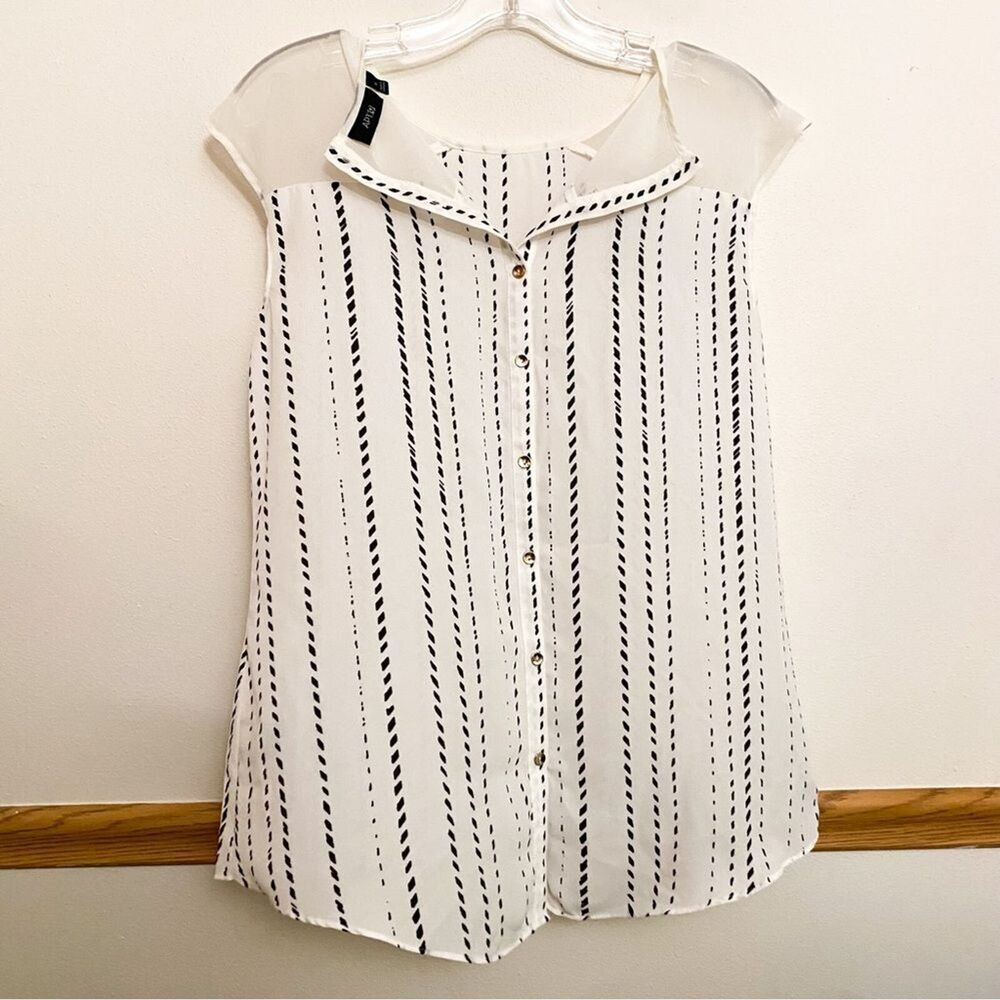 Women medium Elegant white blouse featuring classic black and white striped